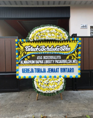Papan Bunga Duka di Baadia